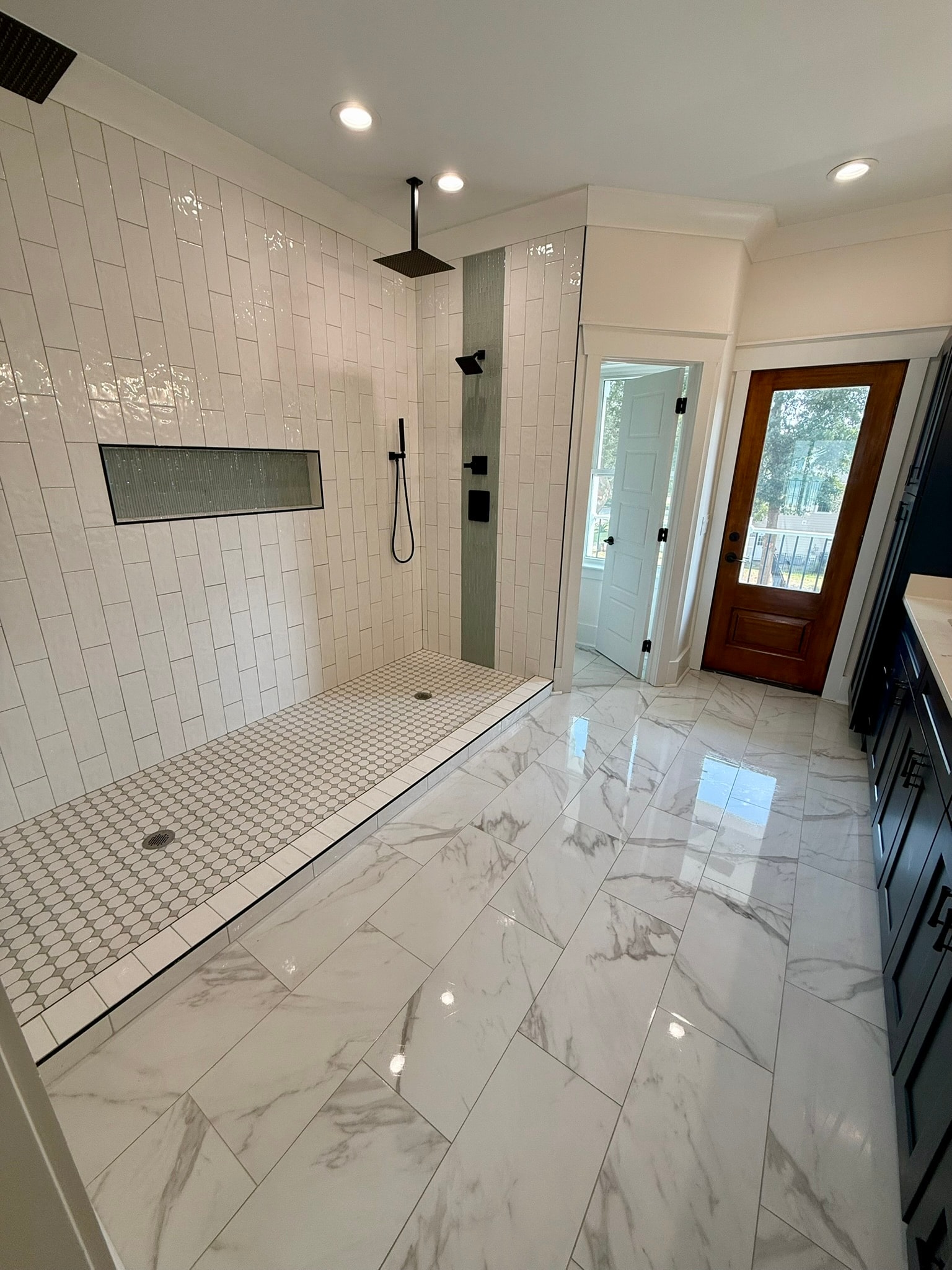 Luxury marble bathroom with walk-in shower